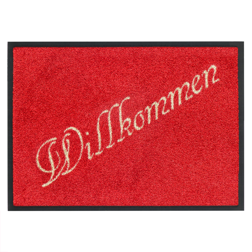 rote Fußmatte mit einem Schriftzug "Willkommen" rote Fußmatte mit einem Schriftzug "Willkommen"